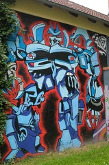 Graffiti an einem Haus im Stollenbachweg